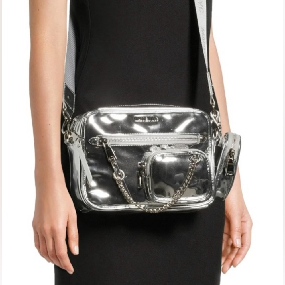 Futuristic Silver Madden NYC Crossbody Bag with Reflective Finish
